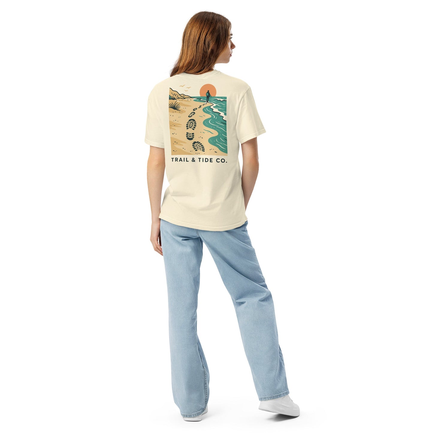 Tidewalker Tee | Bootprints Along Coastal Trail with Sunset and Ocean – Beach Walk Graphic Back Tee with Front Crest Patch (CC1717)